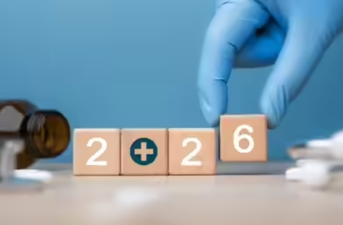 Gloved hand rearranging blocks showing “2 + 2 = 6” symbolizing AI-driven innovation and unconventional outcomes in modern healthcare decision-making.