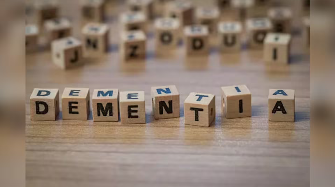 Dementia word formed with wooden blocks symbolising brain health, Alzheimer’s disease and cognitive decline awareness