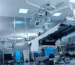 Modern hospital operation theatre with surgical lights and medical equipment highlighting healthcare infrastructure and medical device usage