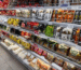 Packaged and processed food items displayed on supermarket shelves highlighting concerns about nutrition labelling and unhealthy foods