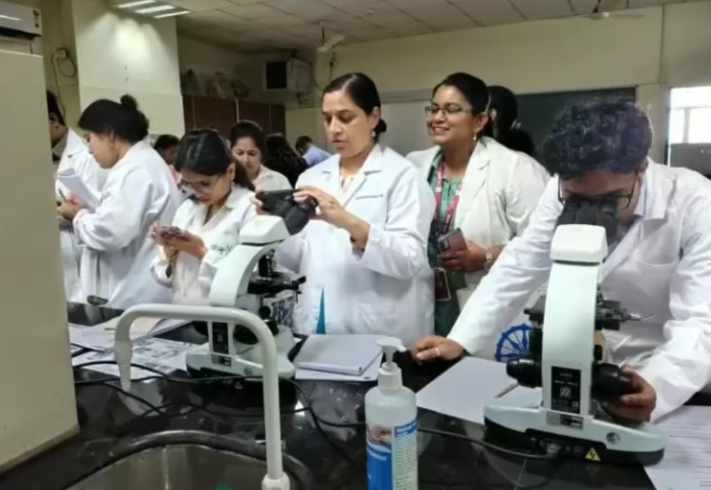 MBBS students conducting laboratory experiments using microscopes in a medical college lab in India