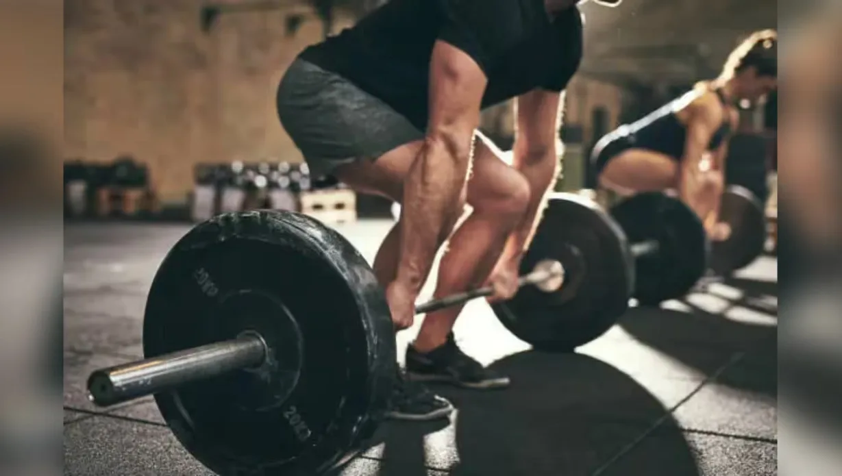 Strength training workout with barbell exercises linked to lower risk of death and improved long-term health outcomes.